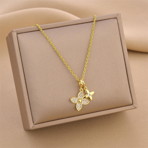 Anthropologie Jewelry - Stainless Steel Sparkly Gold Flower Pendant Necklace